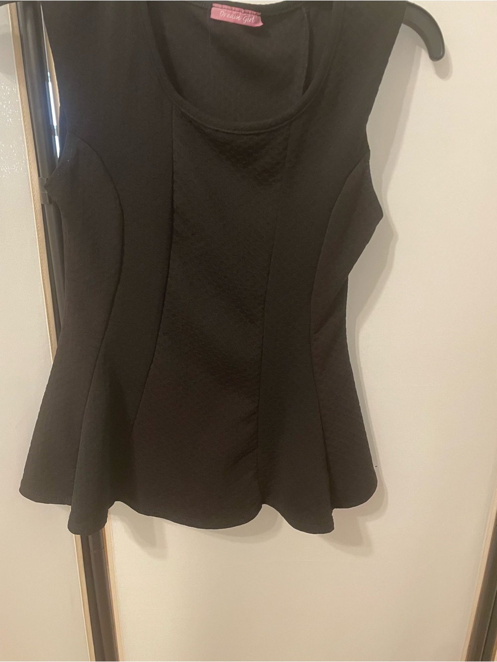 Black Sleeveless Peplum Top